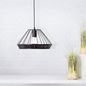 Preview: Brilliant Tory Pendelleuchte, 1-flammig E27 Schwarz Matt Rattan 99264/06
