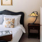 Preview: Elstead Pomeroy Tischlampe E27 Western Bronze mit Kunstglas Schirm Tiffanyglas