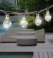 Preview: Globo Solar-Lichterkette LED Solar-Lichterkette 50-fach 0,06W Warmweiß IP44 Amber, Kunststoff Ø6cm 33694-10